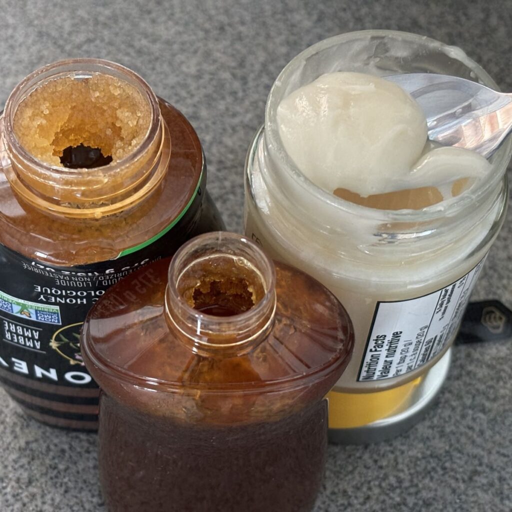 Comparison of big-brand organic honey (top left), raw honey packaged fresh on the farm (top right) and manuka honey (bottom). Both big brand honeys had showed significant signs of aging (crystalization at the top) and tasted generically sweet and flat. The fresh raw honey has a subtle bouquet of flavours.