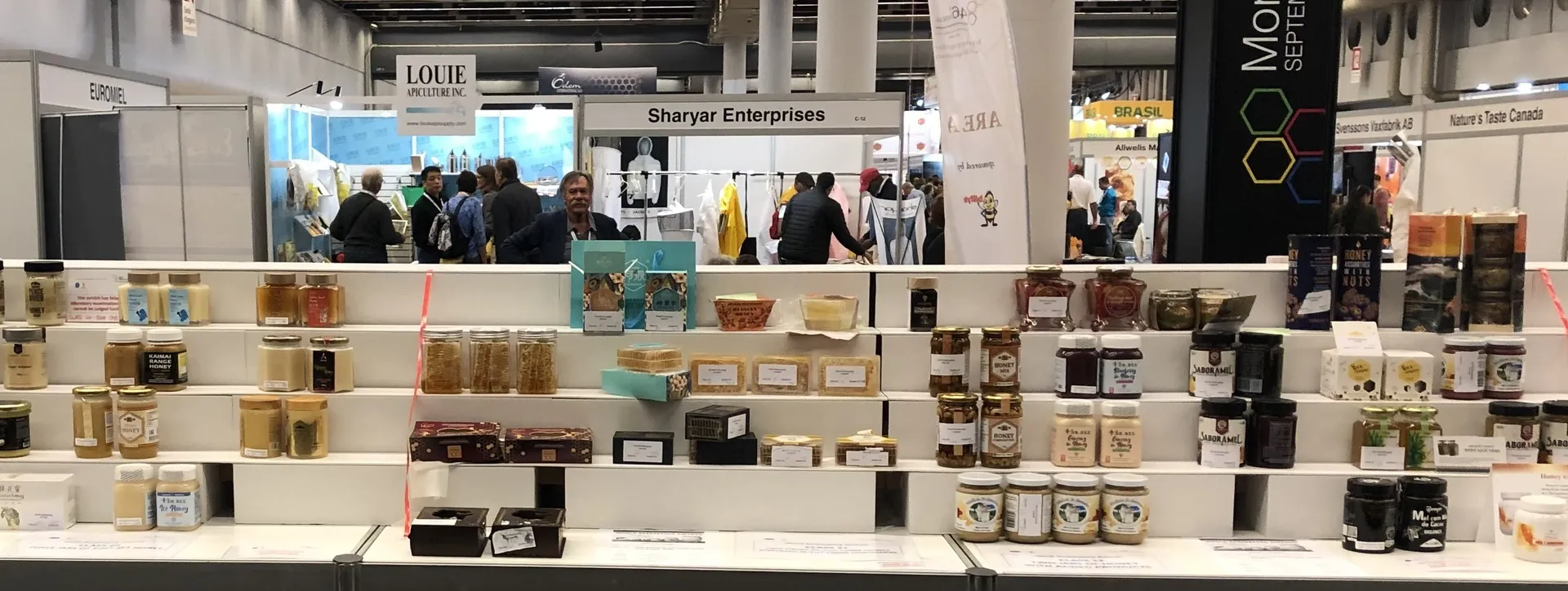 Some competitors in the 2019 World Beekeeping Awards, with Tim in the background.