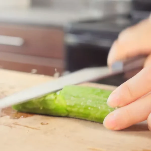 Smashing the cucumber is not only great for relieving stress, it enhances the flavor and texture of the dish