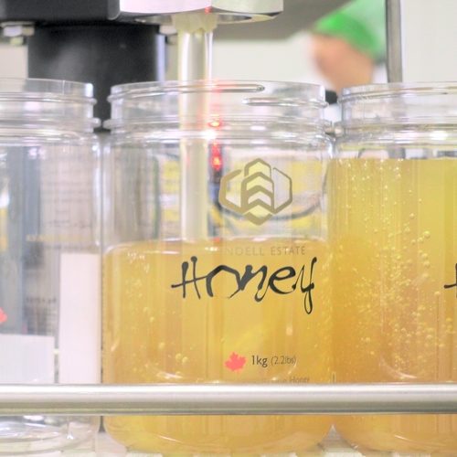 At room temperature, unheated, viscous honey flows slowly